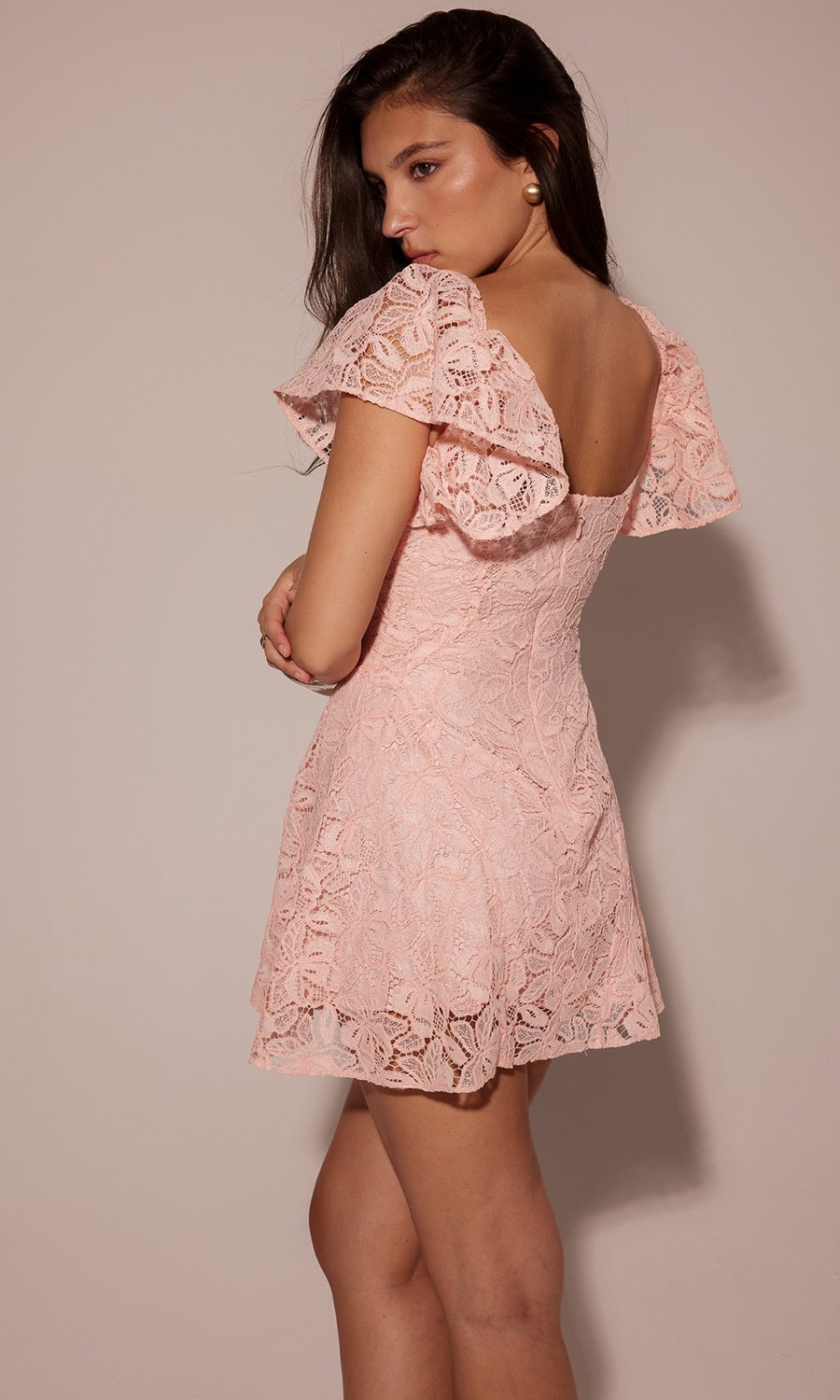 Pink lace dress with ruffled cap sleeves and open back design for elegant daily fashion