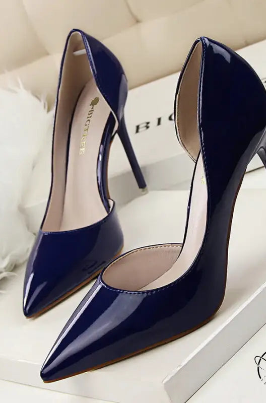 Navy blue patent leather low cut high heels with pointed toes