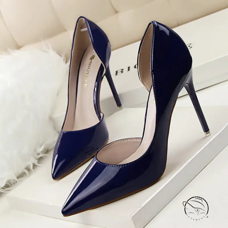 Navy blue patent leather low cut high heels with pointed toes