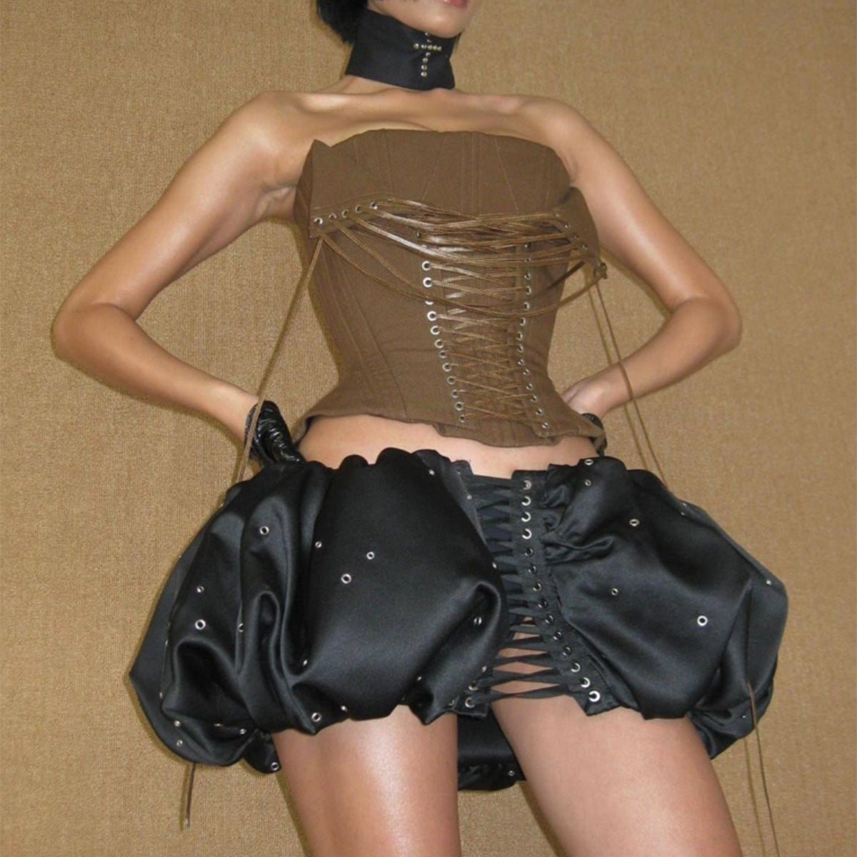 Elegant advanced design boning corset in brown leather with black lace-up details