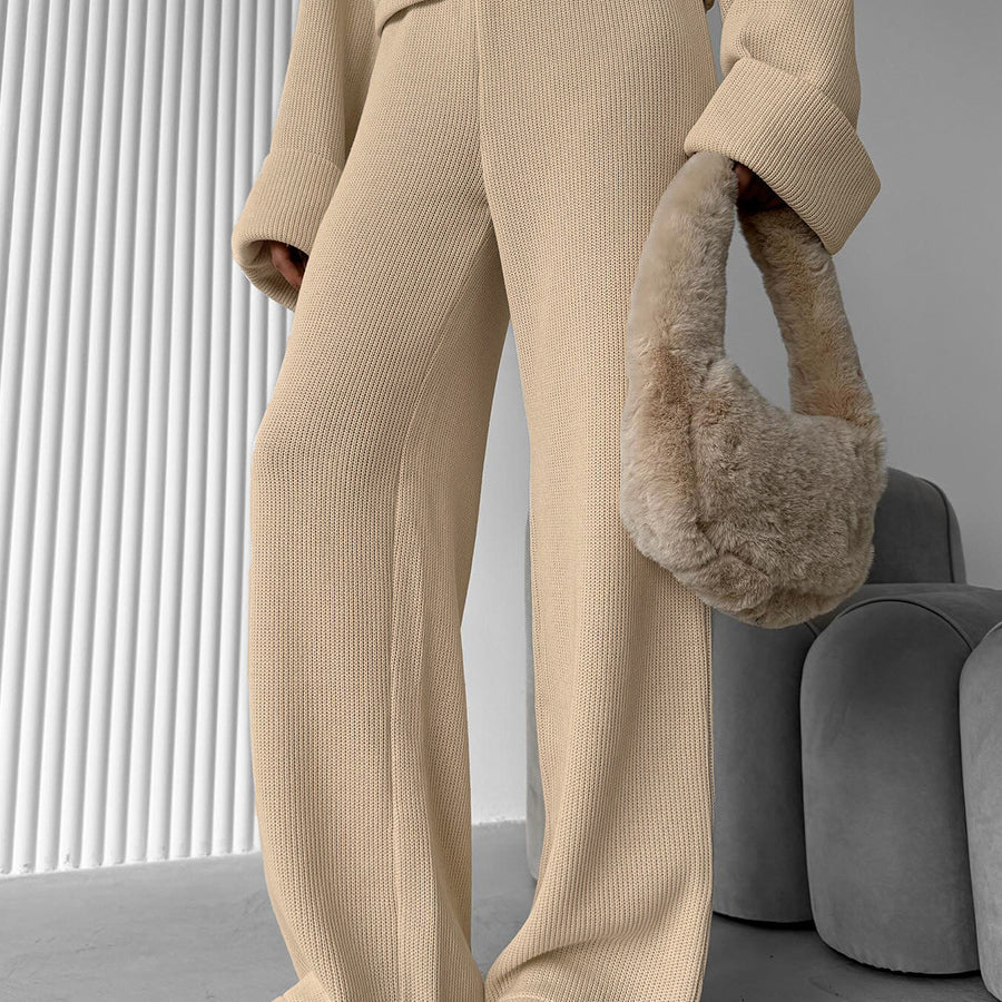 Enchanting Langry fashion beige ribbed knit sweater and wide leg pants set with fur-trimmed bag