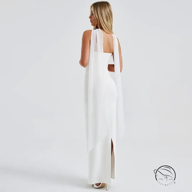 Elegant white sleeveless langry fashion gown with sheer cape for winter evenings
