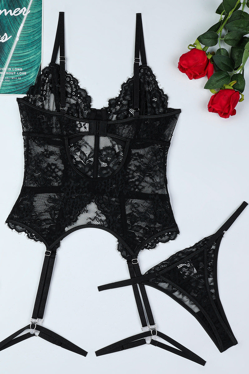 Black lace lingerie set featuring corset top, garter straps, and matching thong for fashion ملابس