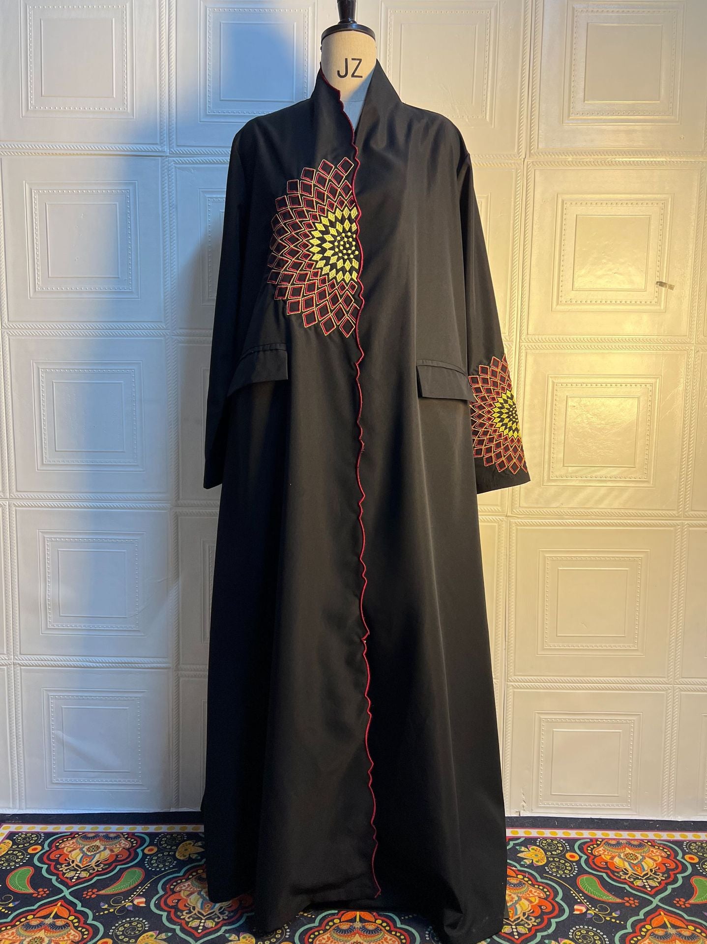 Black abaya trench coat with colorful geometric embroidery in langry fashion