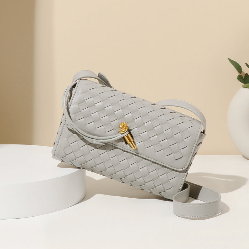Gray woven leather handbag with gold clasp from the Elegant Woven Shoulder Bag collection