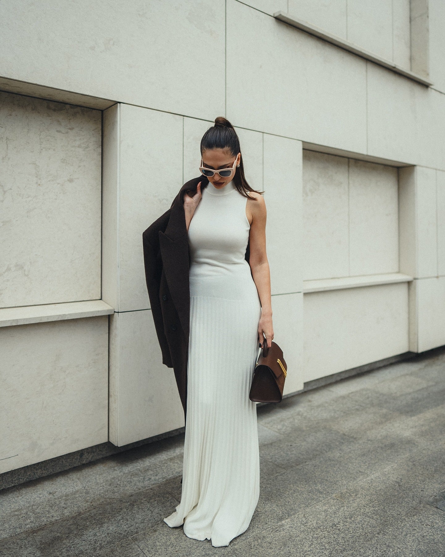 Sleek white floor-length Enchanting Knitted Maxi Dress showcasing a fitted silhouette in fashion