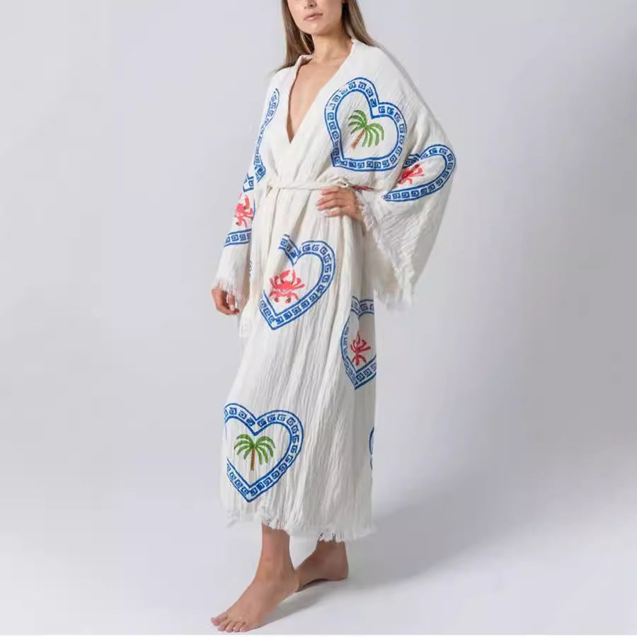 White long kaftan with blue heart embroidery and fringe trim, ideal for loose positioning printed home wear