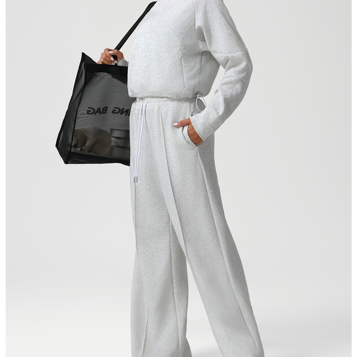 Light gray langry fashion jumpsuit with drawstring waist and long sleeves