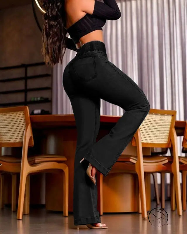 Beautiful stretch hip lifting denim trousers in black high-waisted flare style