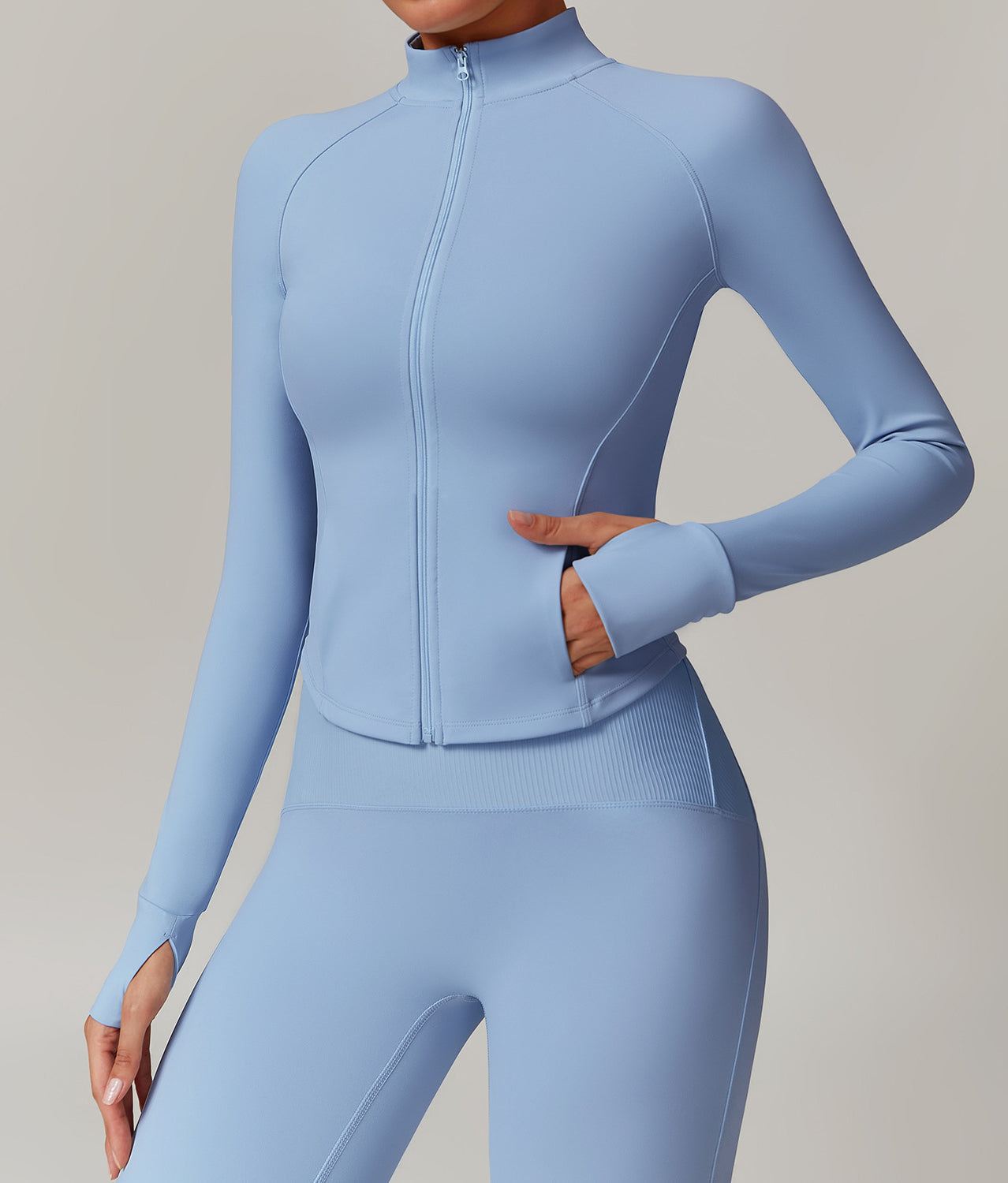Light blue Langry fitted athletic jacket and leggings for stylish yoga and sports fashion