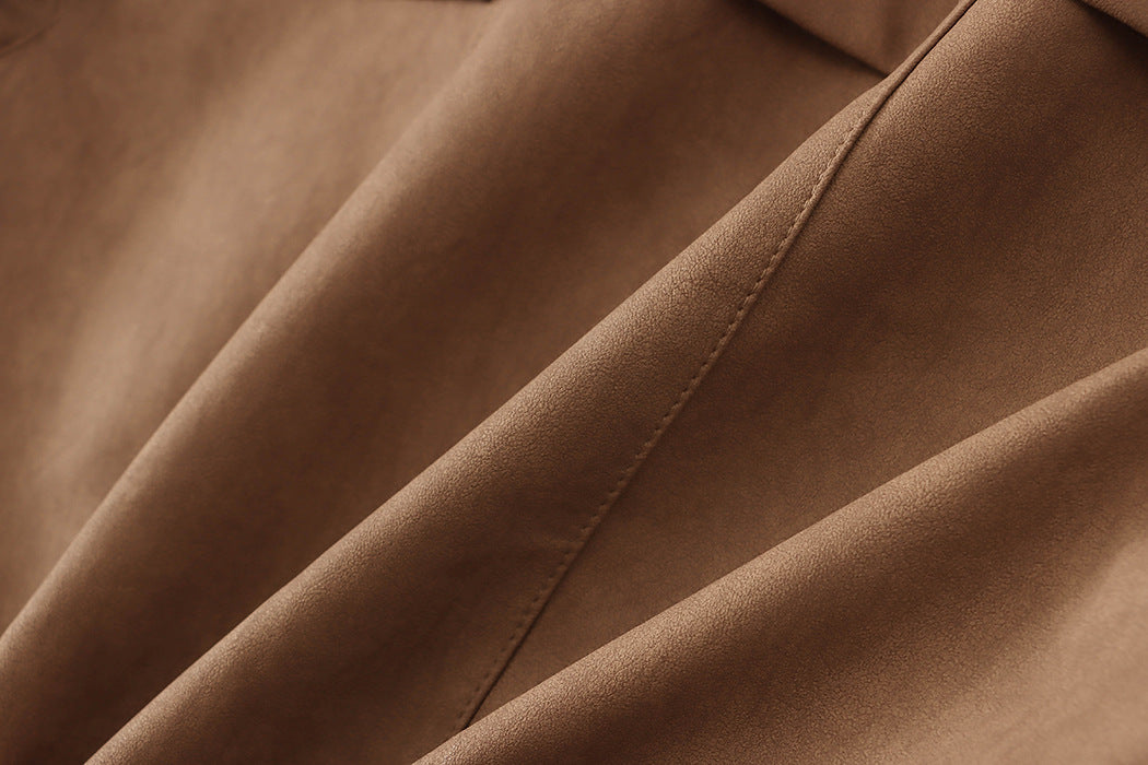 Wrinkled brown fabric detail from high-quality casual leather coat for fashionable ملابس