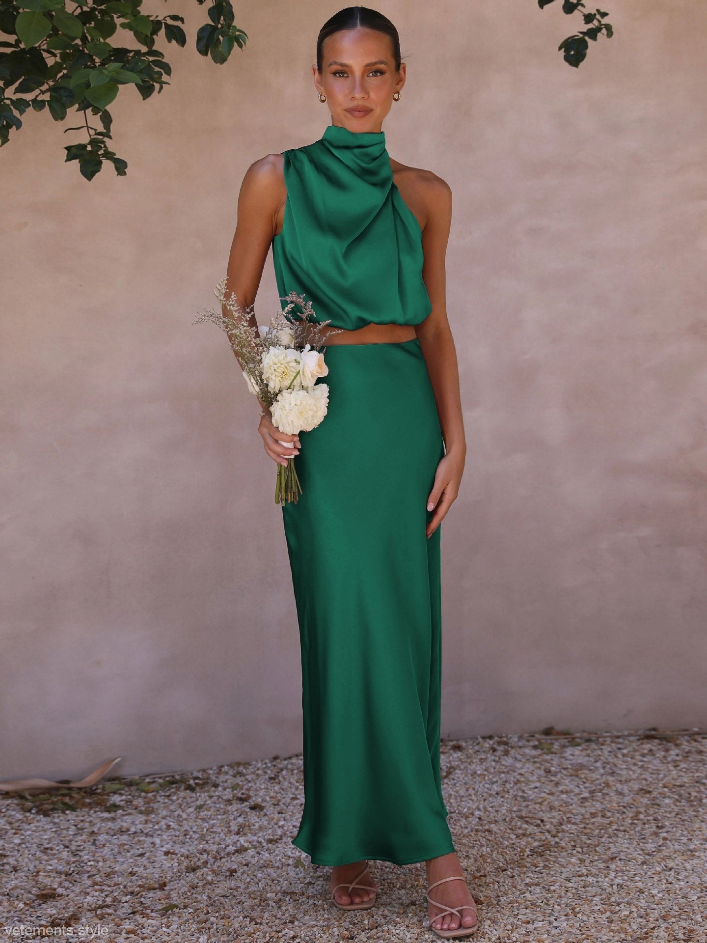 Elegant emerald green satin draping skirt set for a sophisticated dress draping skirt look
