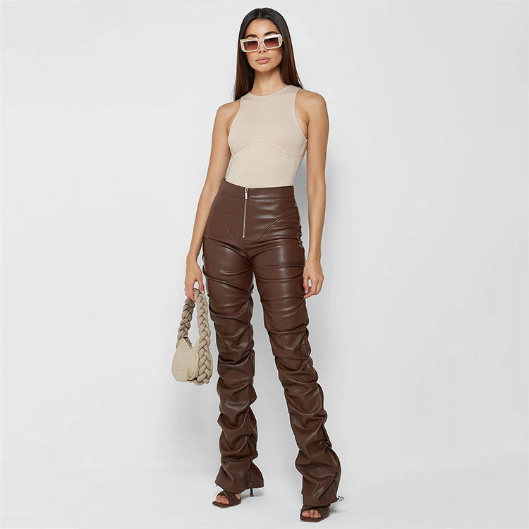 Woman wearing fashionable brown faux leather pants from the Langry Tight Faux Leather Four Seasons collection