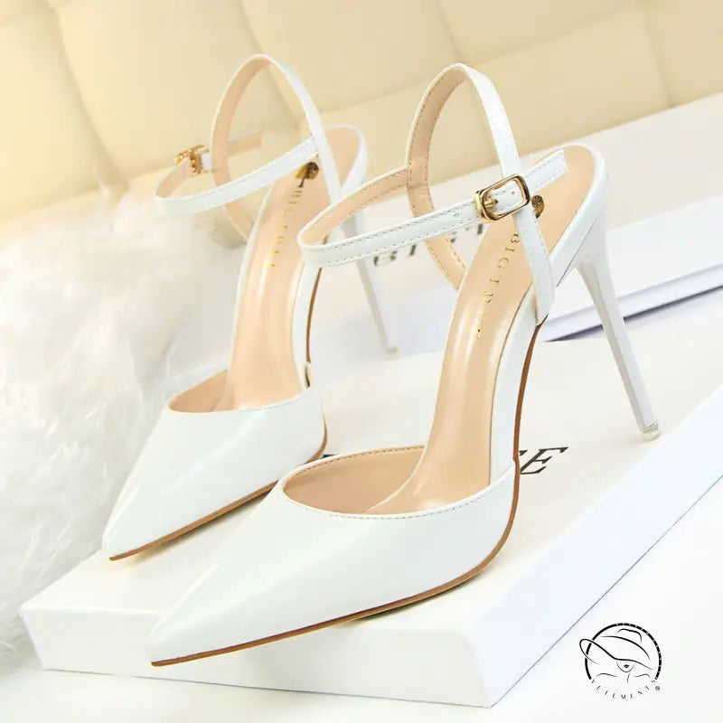 White leather slim fit strap high heel sandals with gold accents