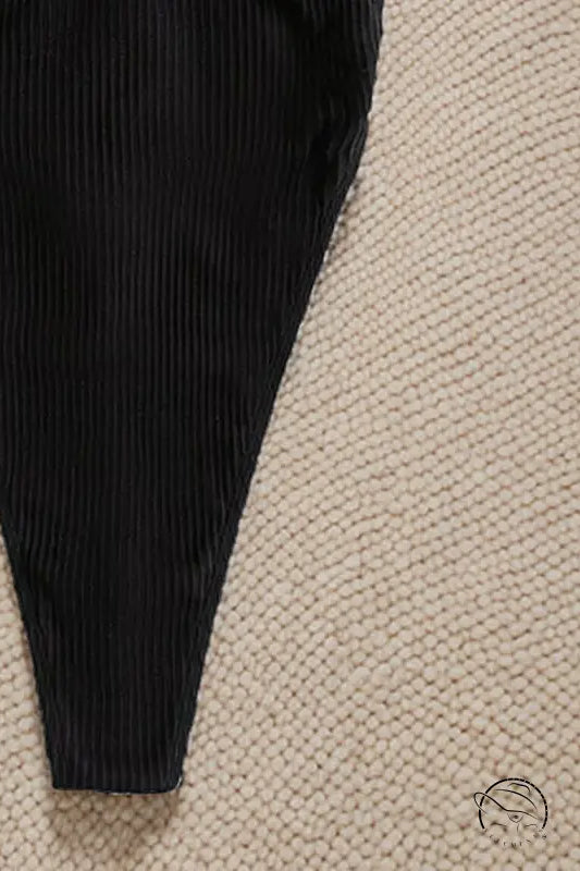 Black ribbed fabric sleeve for attractive one piece bikini fashion