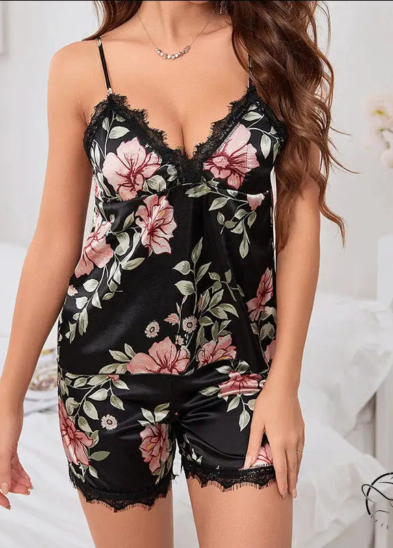 Black satin langry pajama set with pink floral print and lace trim