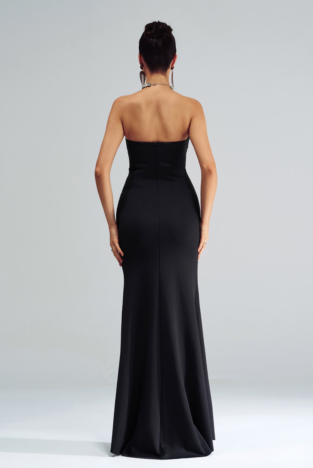 Stunning Split Cocktail Evening Dress featuring a strapless black evening gown in fashion