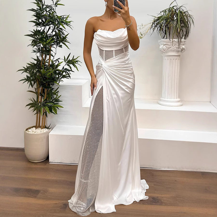 Elegant white strapless gown with high slit showcasing fashion and ملابس for formal events