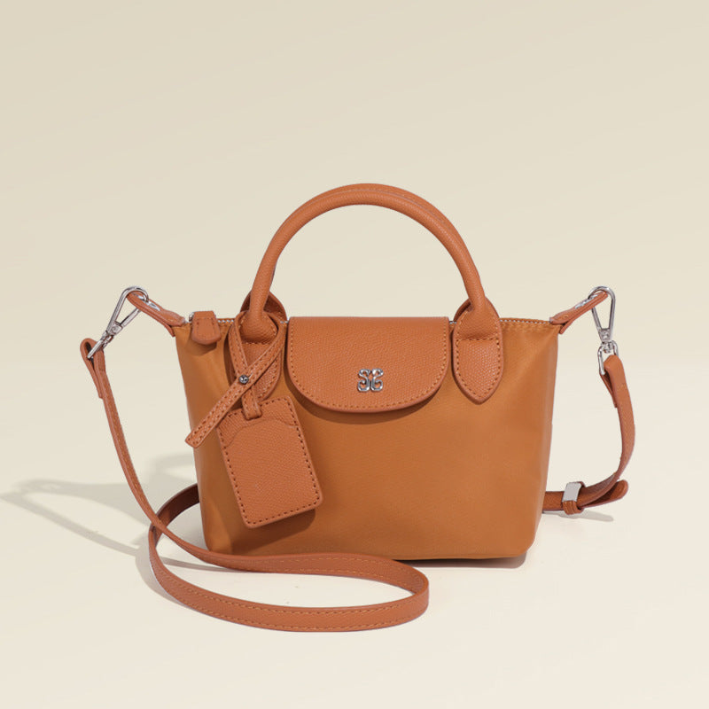 Brown leather handbag with shoulder strap, perfect for stylish outfits by Langry