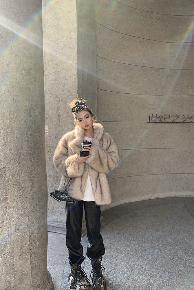 Langry faux fur winter jacket with black pants and roller skates