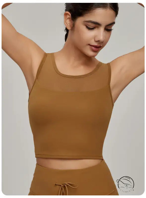 Beauty Back Mesh Workout Top in fitted dark tan scoop-neck design with chest paneling