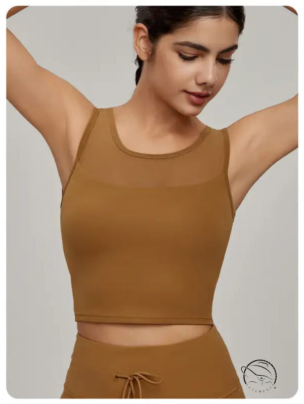 Beauty Back Mesh Workout Top in fitted dark tan scoop-neck design with chest paneling