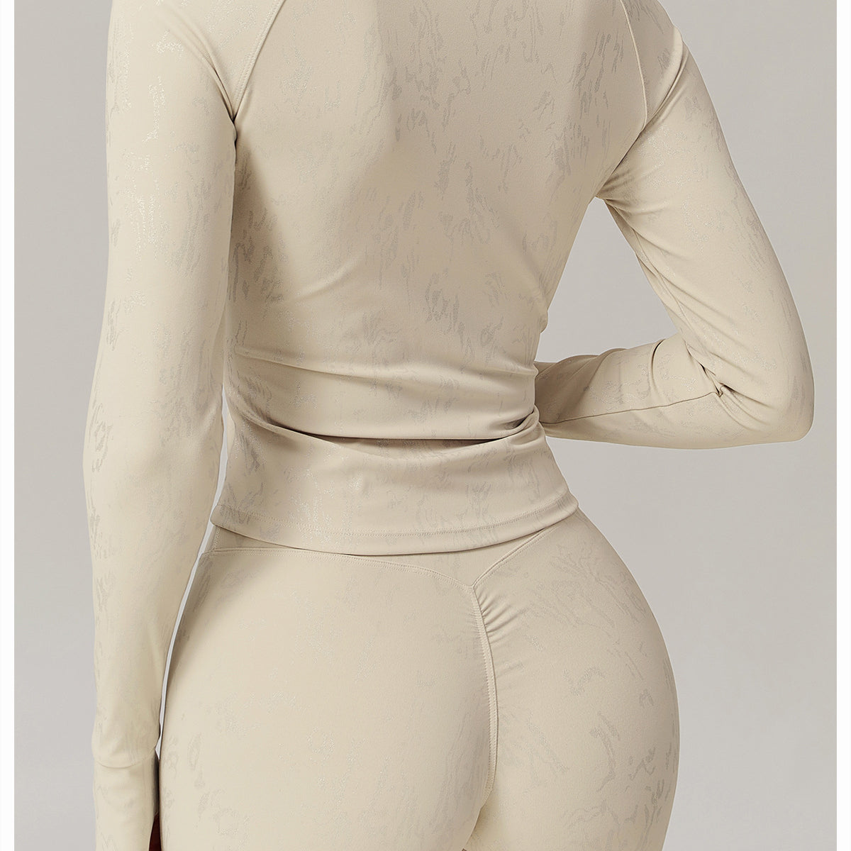 Light beige fitted athletic top with mock neck and matching shorts from Quick Drying Breathable Yoga Wear Coat