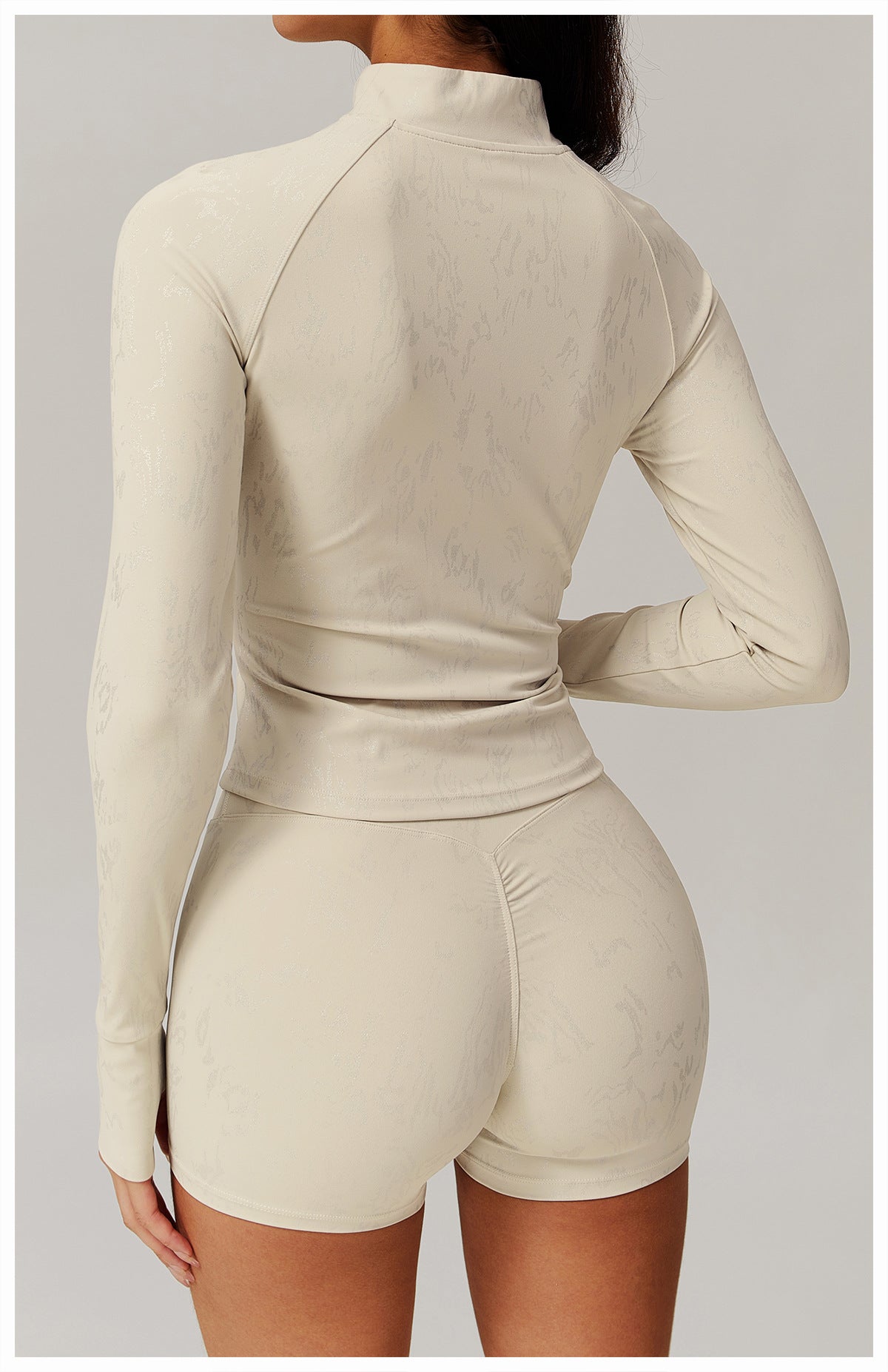 Light beige fitted athletic top with mock neck and matching shorts from Quick Drying Breathable Yoga Wear Coat
