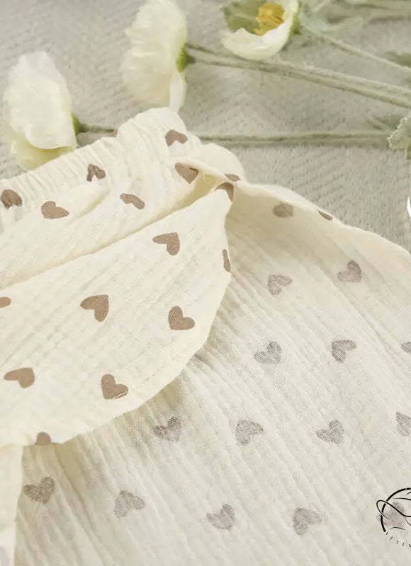 Summer cotton linen heart print slit shorts in cream fabric