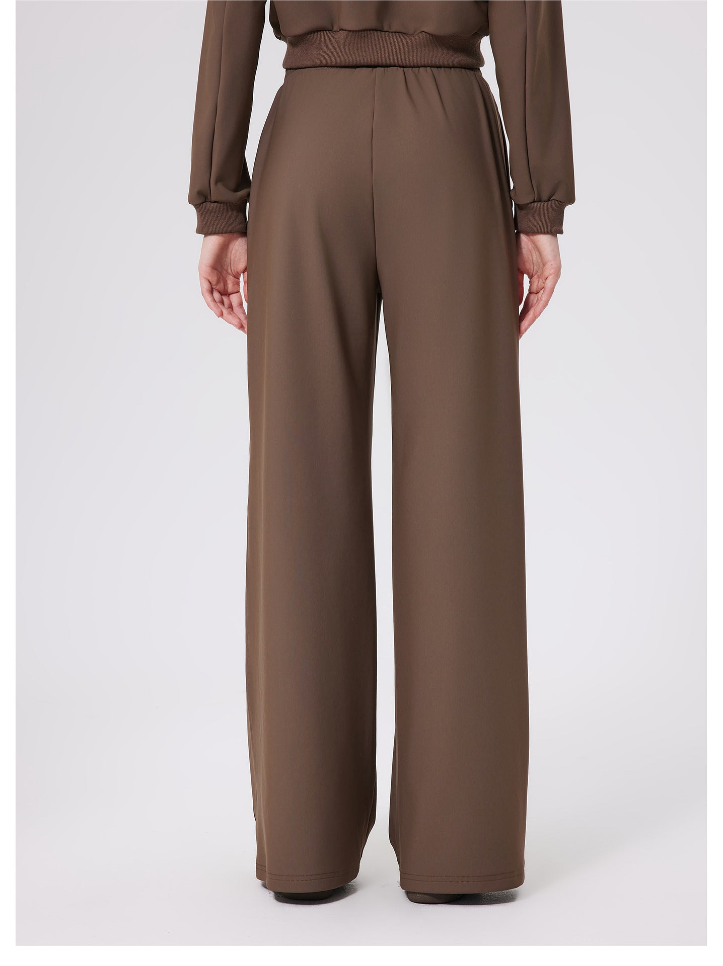 Brown loose fitness warm pants with elastic waistband and side pockets