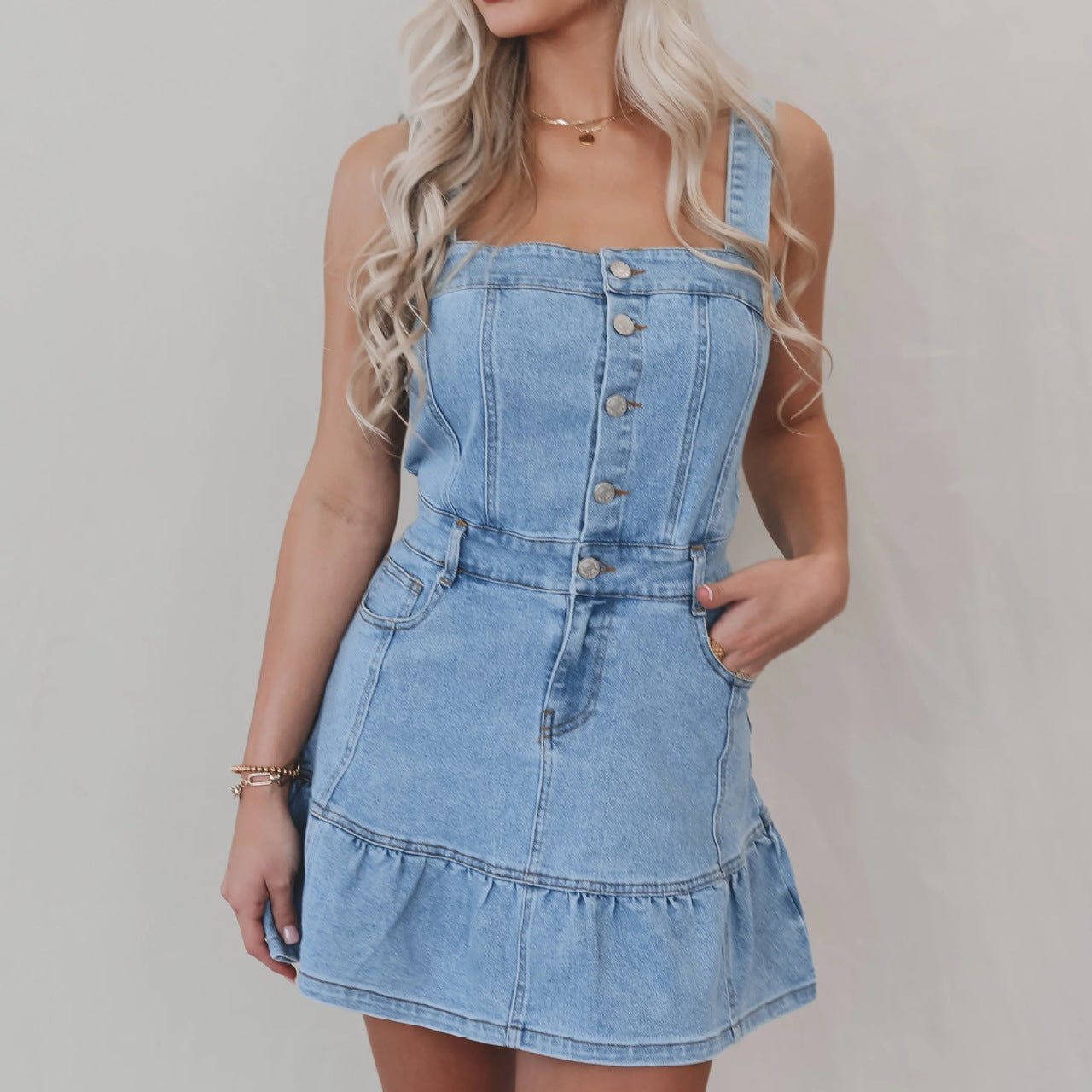 Light blue denim mini dress with suspenders and ruffled hem for office suspenders denim style