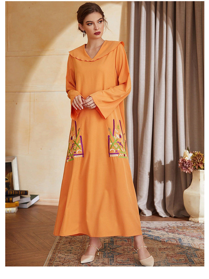 Orange embroidered langry abaya with bell sleeves and scalloped V neckline