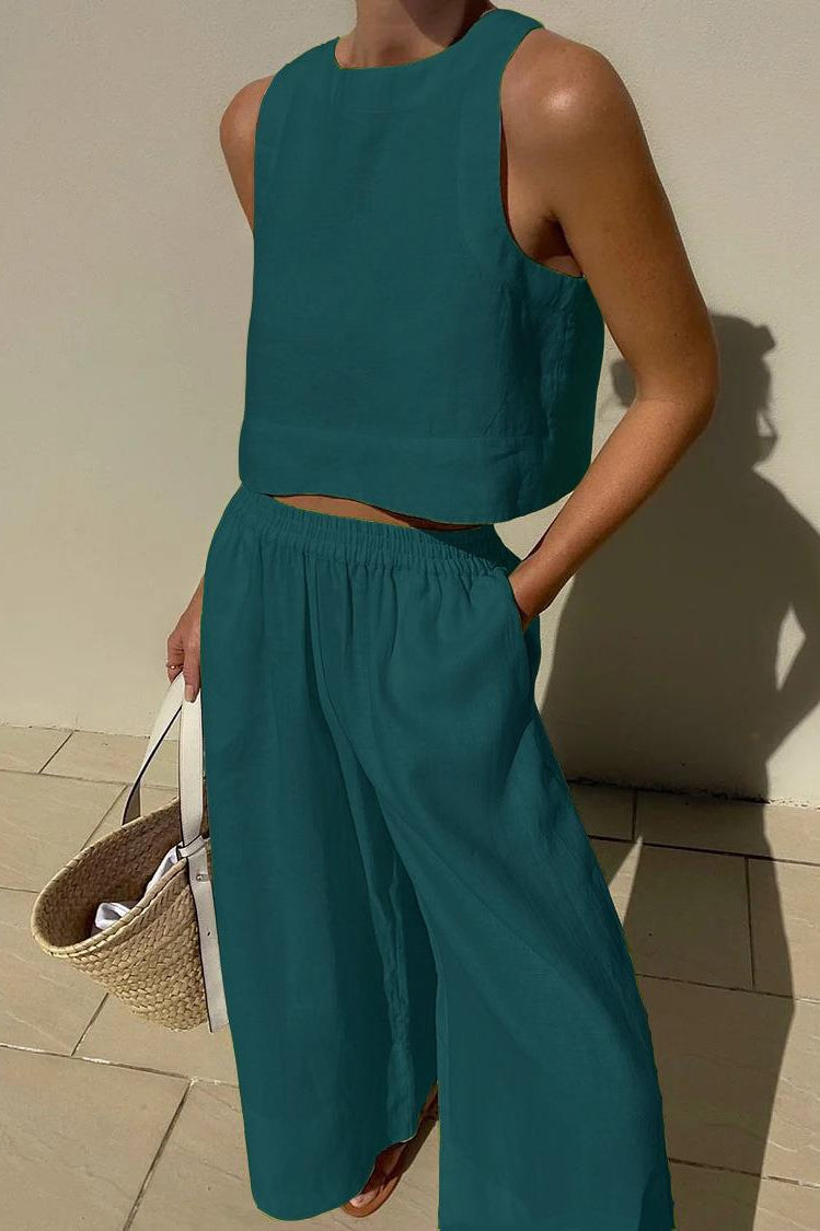 Teal two-piece outfit from Langry, featuring a casual loose sleeveless shirt
