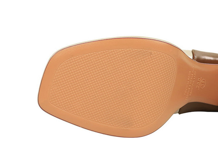 Fashionable langry tan leather high heel sandal with floral heel design