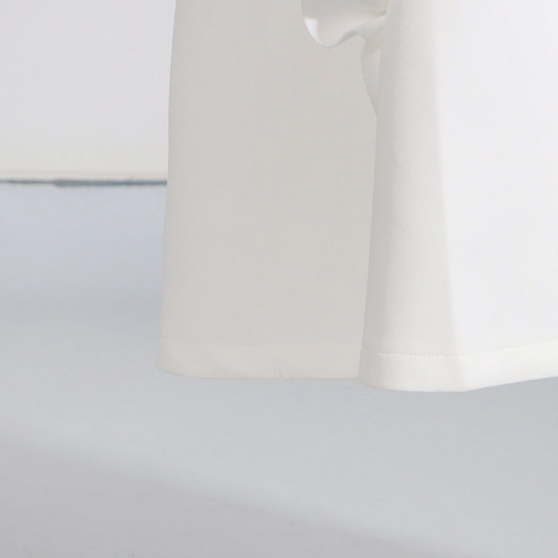 White ceramic mug beside a High Grade Stitching Floral Summer dress for women in langry fashion