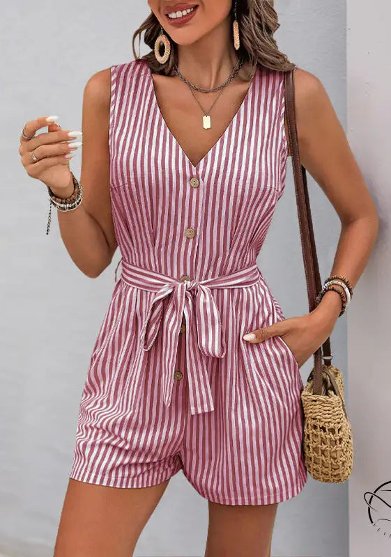 Beautiful summer jumpsuit: sleeveless red and white striped romper with V-neck, pockets, and waist tie