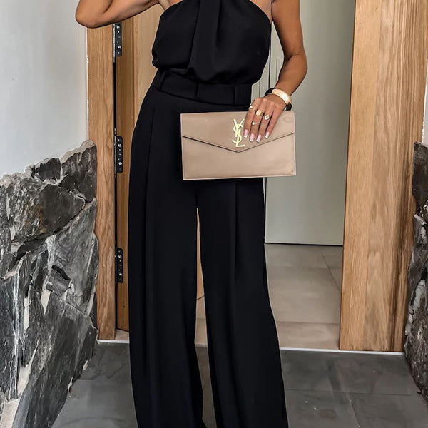 Black halter jumpsuit from the Summer Casual collection, ideal for vacation fashion
