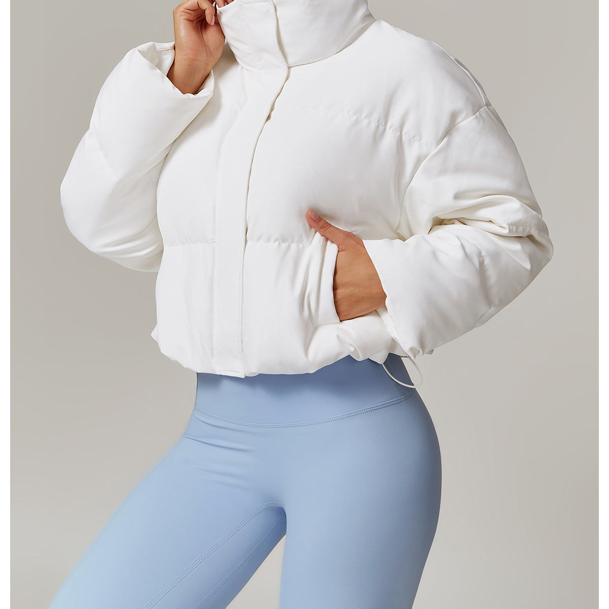White puffer jacket with blue leggings from Comfortable Warm Jacket, stylish langry fashion symbolizing ملابس