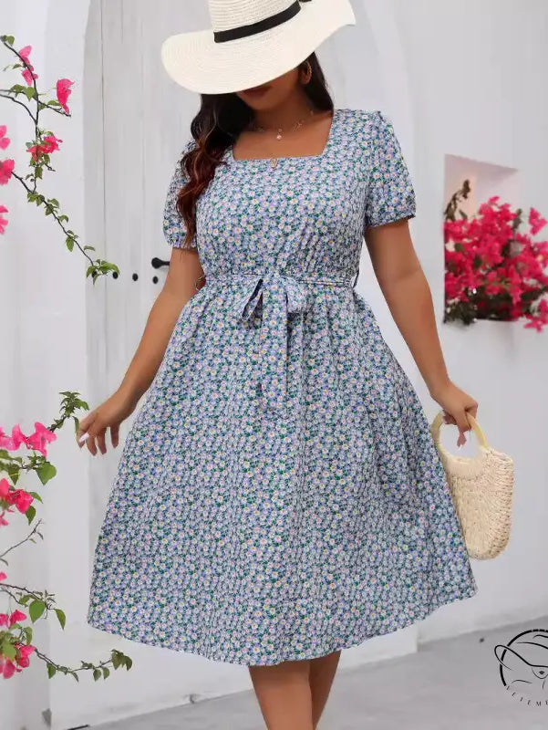 Light blue square-neck floral summer dress with puff sleeves and tie-waist