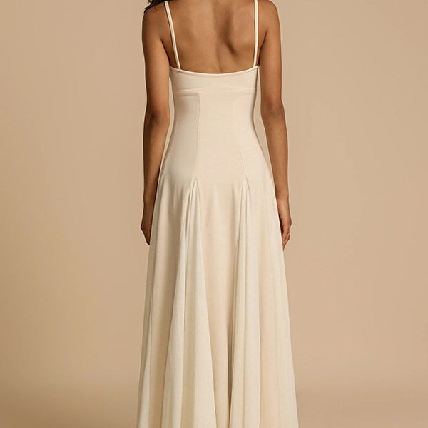 Sleeveless cream-colored casual loose large swing dress displayed on a model