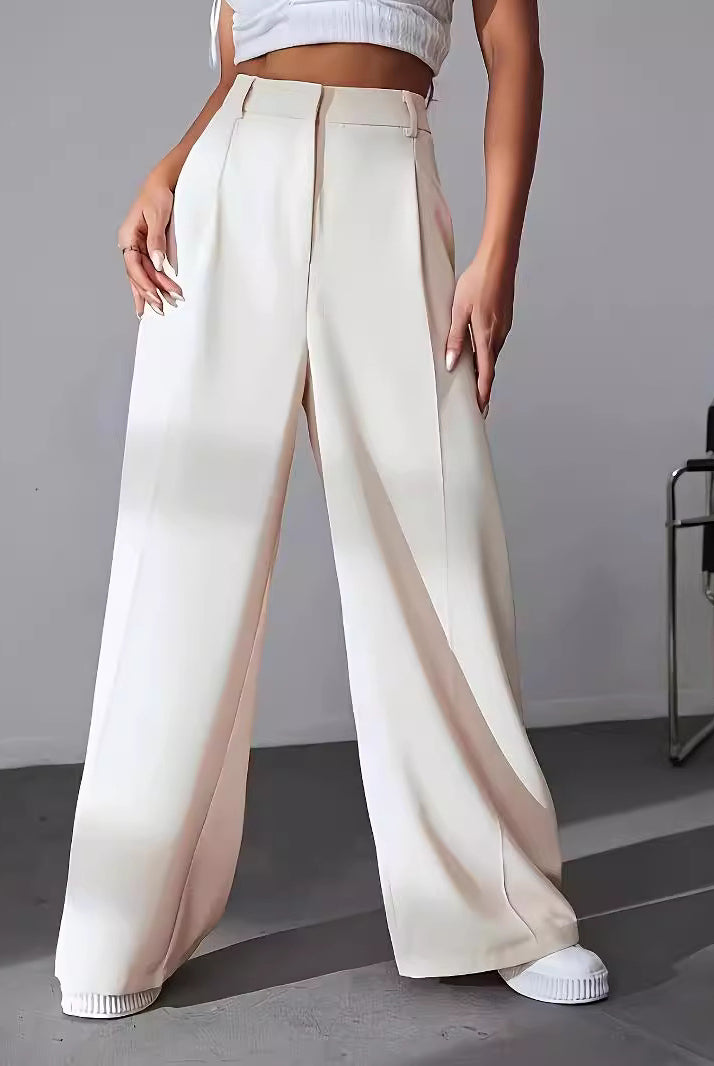 Cream-colored wide leg trousers with pleats, perfect for women’s fashion and work attire