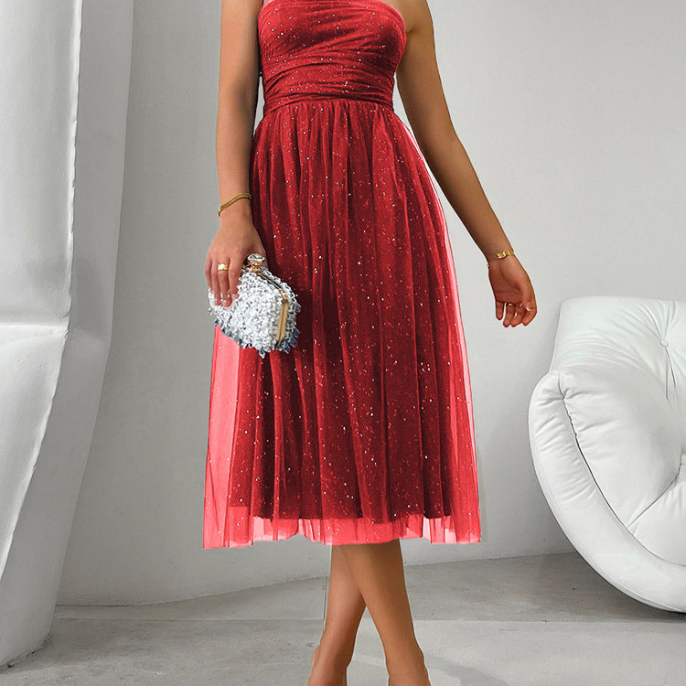 Strapless red tulle midi dress with sparkly embellishments, perfect for elegant fashion