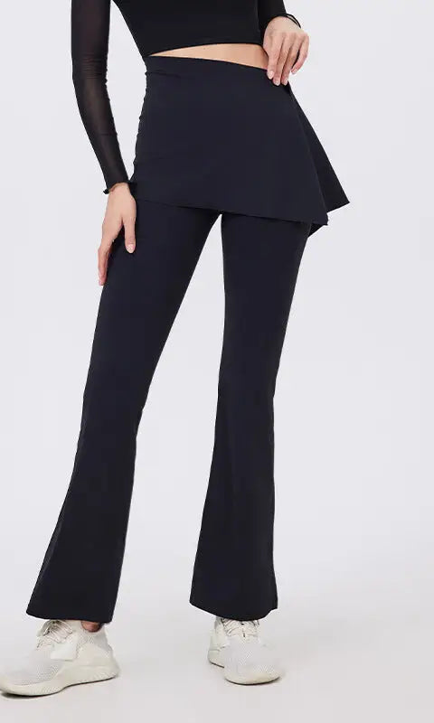 Black hip lifting yoga pants with nude feel peplum hem and white sneakers