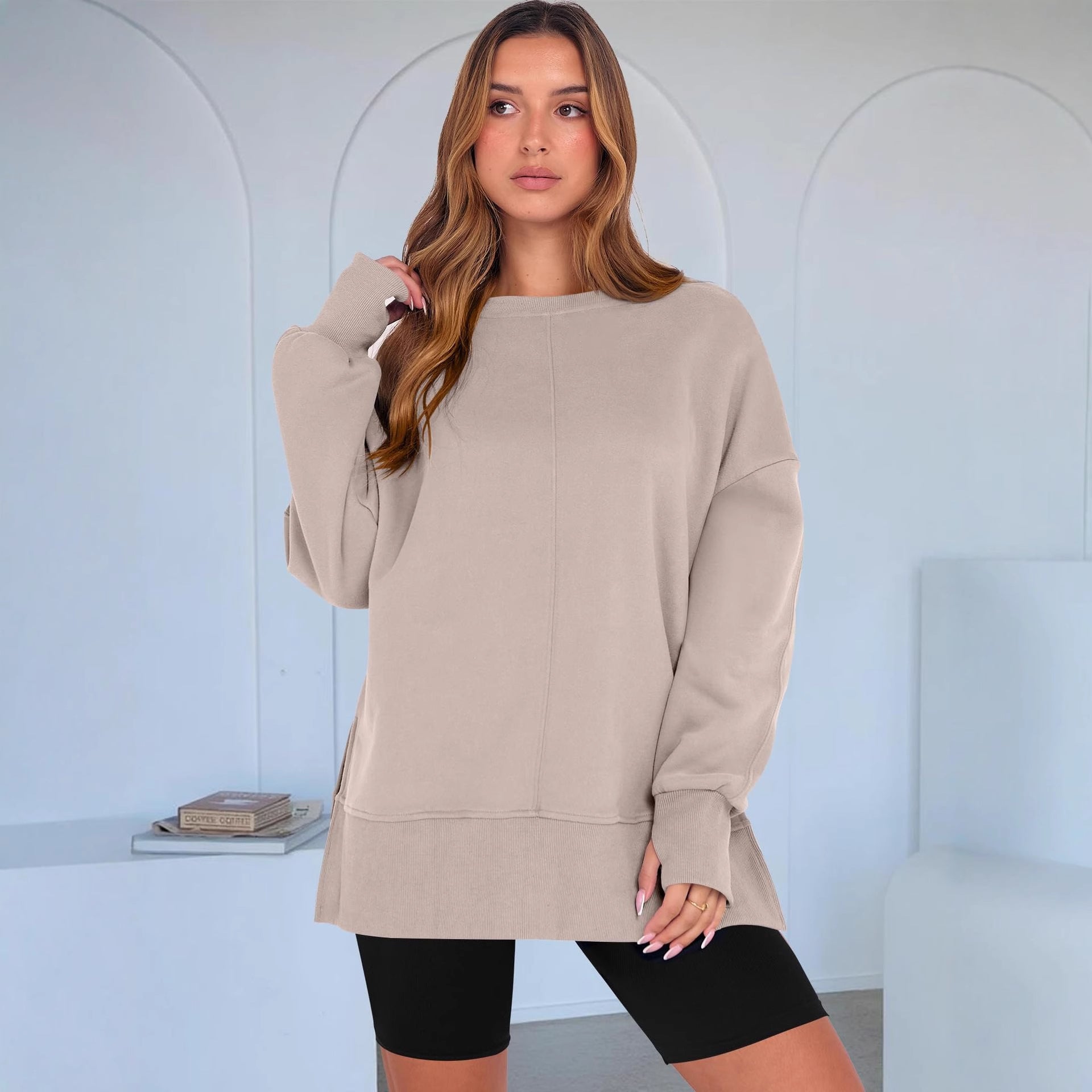 Beige oversized langry fashion sweatshirt with black leggings