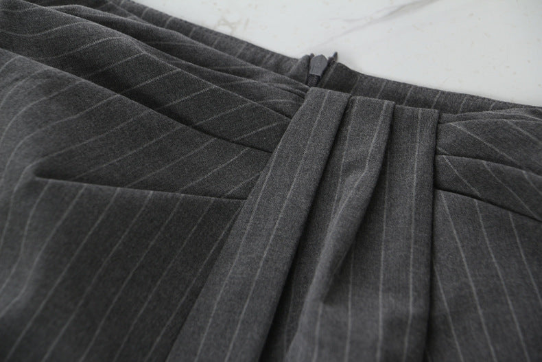 Dark grey pinstriped casual pants suit with pleats and side zipper for stylish comfort
