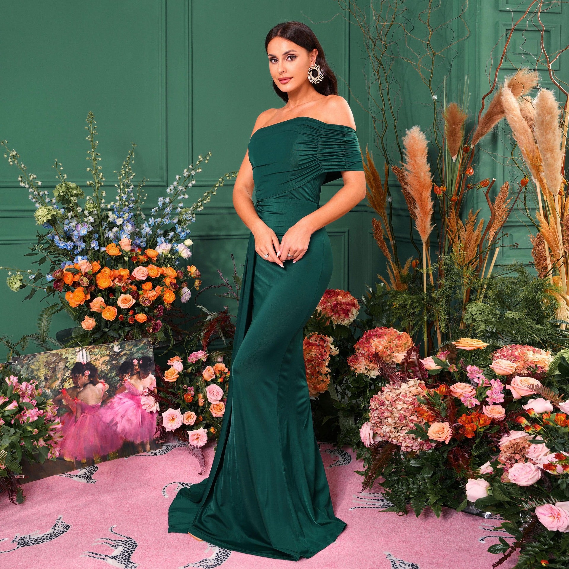 Elegant off-shoulder emerald green mermaid gown, perfect for evening fashion ملابس
