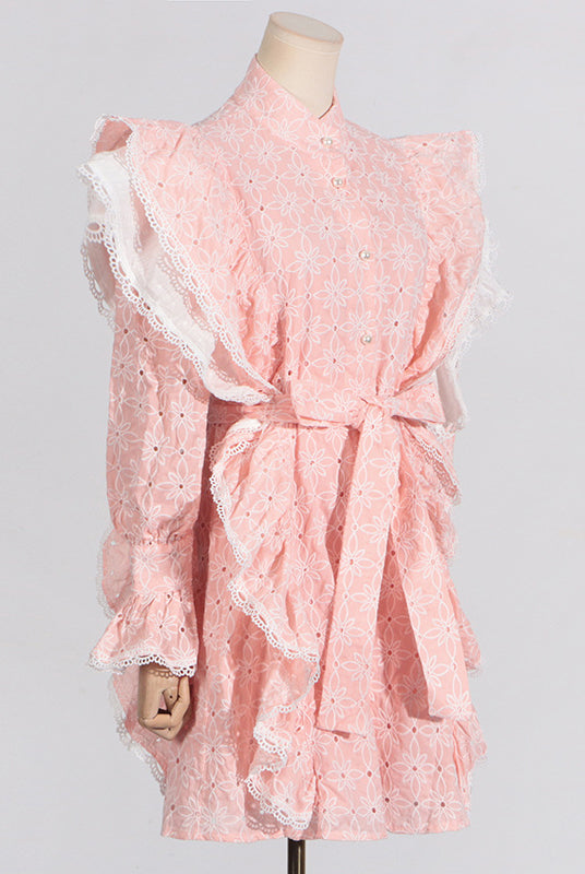 Pink eyelet dress with ruffles featuring a stand collar and stylish bell sleeves