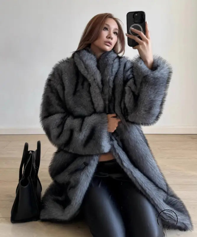 Elegant cozy faux fur coat in gray, long-sleeved fashion design