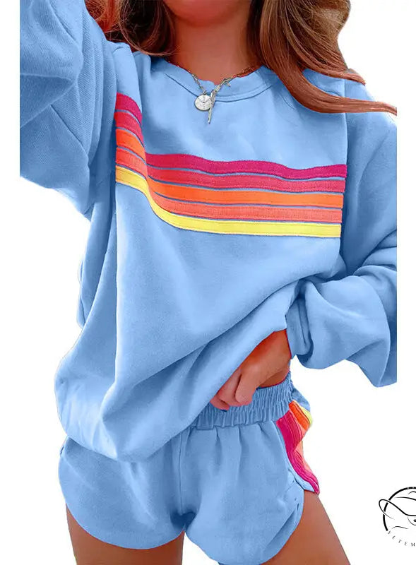 Light blue loose slim fit casual two piece sweatsuit with rainbow stripes