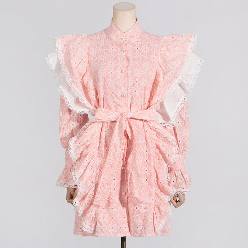 Pink eyelet dress with white lace trim and stand collar for fashionable summer wear